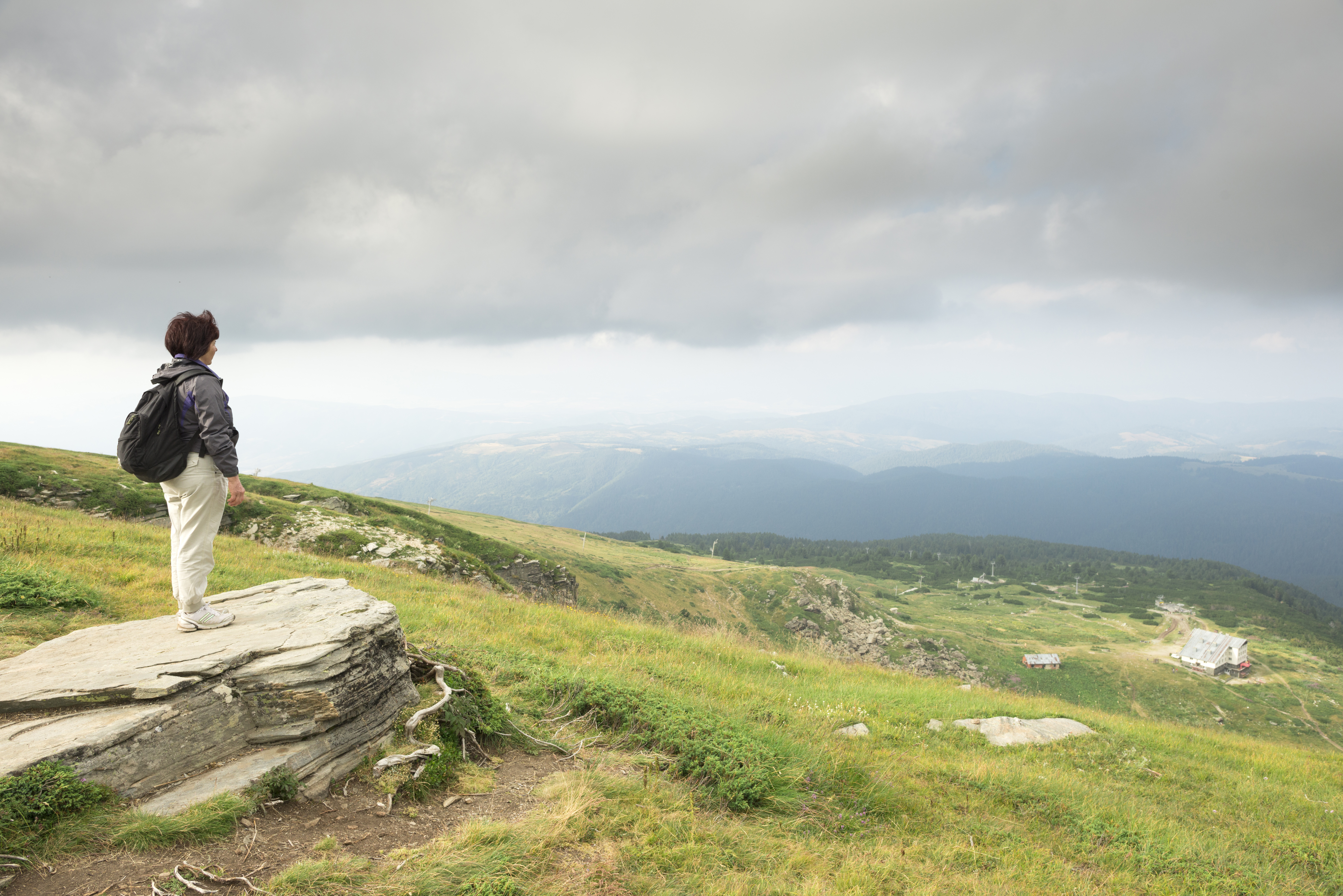 Senior woman looking at the mountain view. Bulgaria, Rila mountain